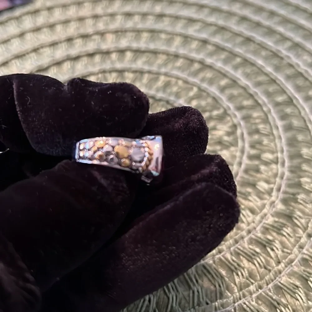 Miss Tina sz5.5 silver colored ring cutouts gold colored accent purple stone EUC